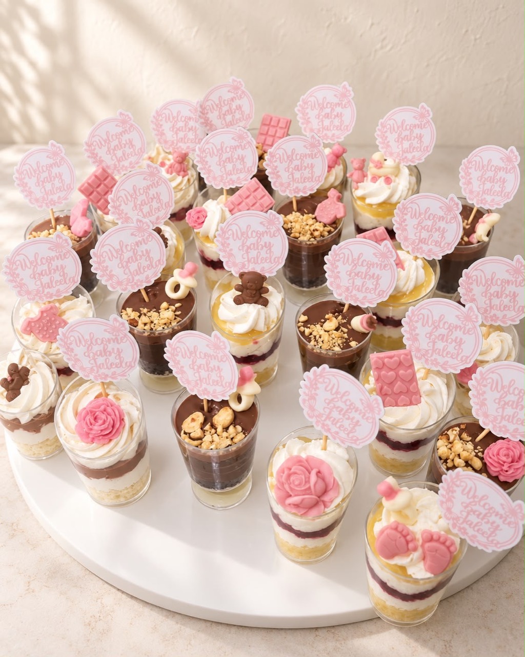 Pink baby celebration dessert table