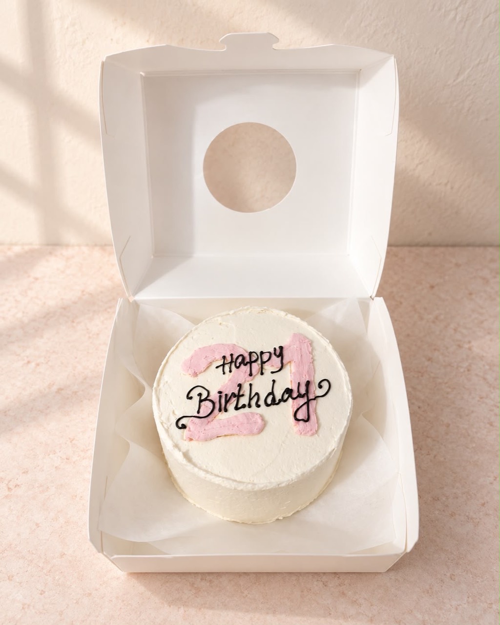 Pink 21st birthday bento cake in a white box