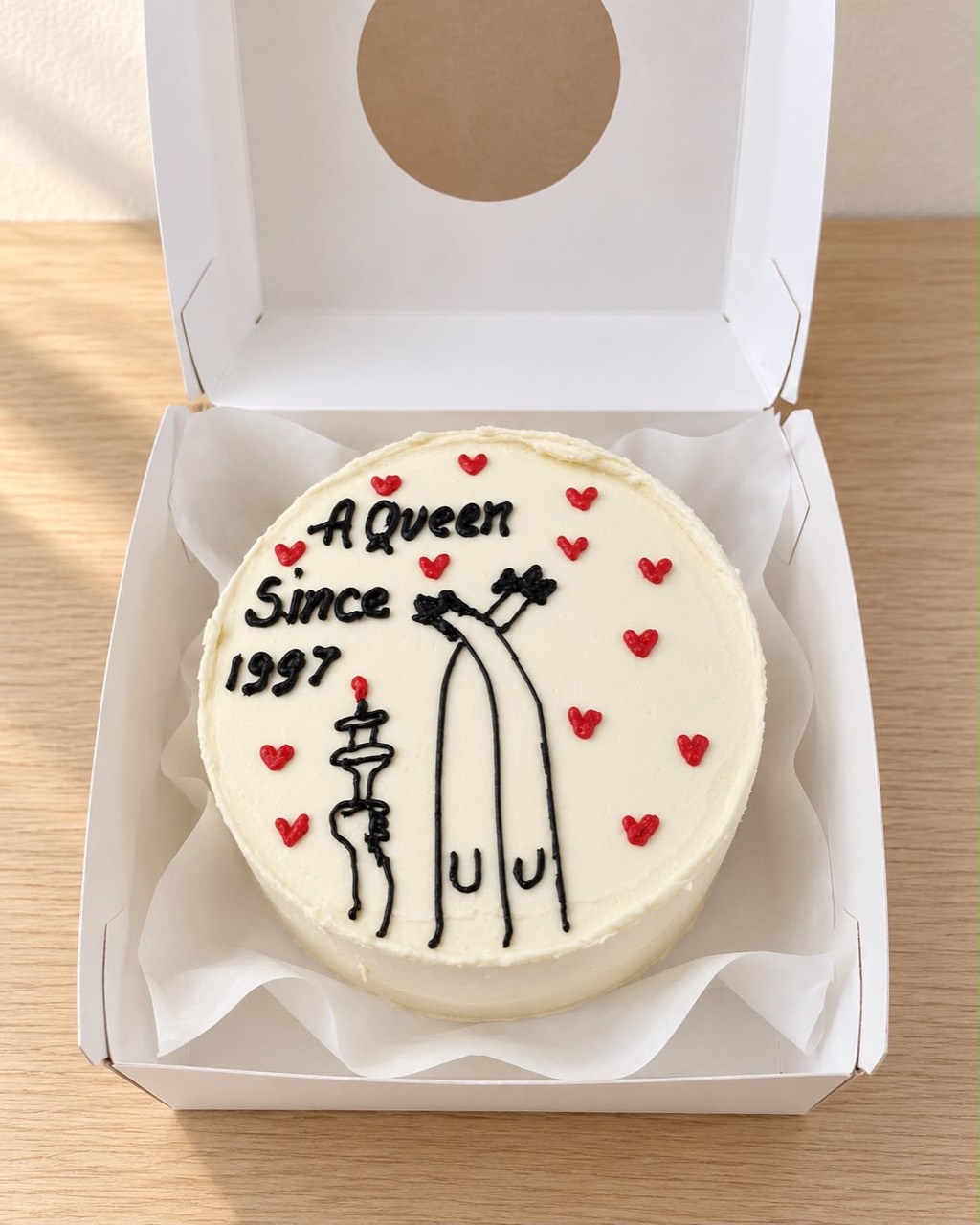 Queen birthday bento cake with red hearts