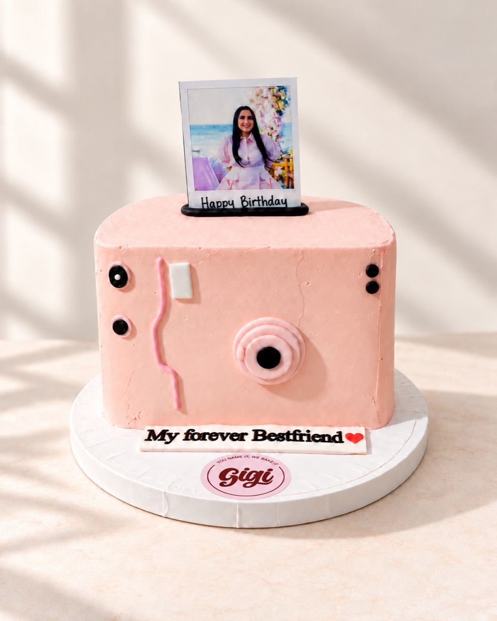 Pink camera birthday cake