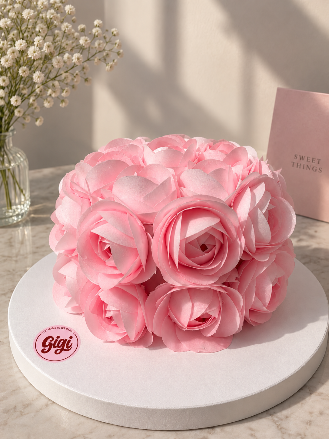 Pink rose petal celebration cake